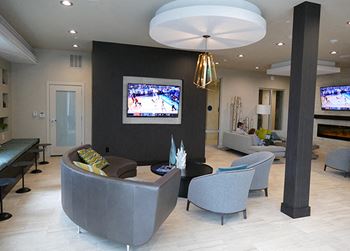 Clubroom with smart tv and fireplace